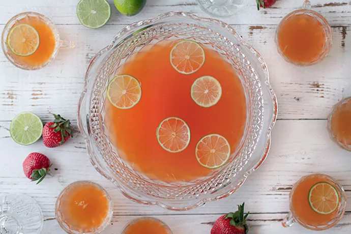 Big batch cocktail recipes like this one for Strawberry Pisco Punch are the life of the party | Honestly Yum