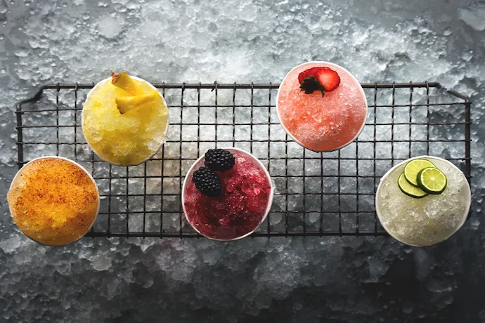 12 delicious, creative frozen cocktails, like these boozy sno cones from Honestly Yum