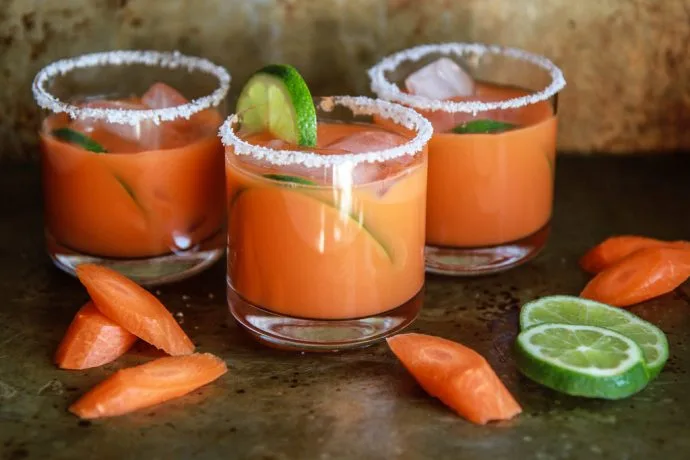 Celebrate Earth Day—or any day!—with a cocktail made with vegetable juice like this Carrot Chili Margarita. Yum! | Heather Christo