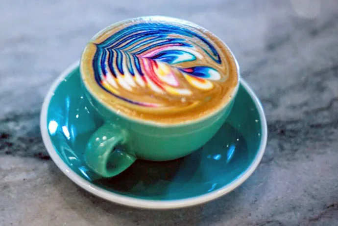 The rainbow food trend hits the coffee bar: Rainbow latte art by @ibrewcoffee on Instagram