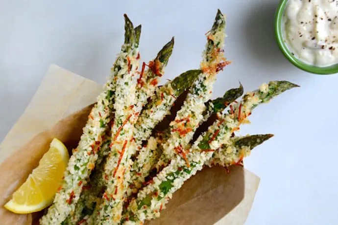 If you're looking for some family-friendly asparagus recipes, try Cheesy Baked Asparagus Fries. They're as fun to eat as they are delicious. | Just A Taste