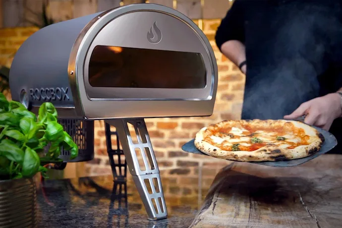 Make delicious brick-oven pizzas anywhere, with the portable Roccbox stone pizza oven. | Cool Mom Eats