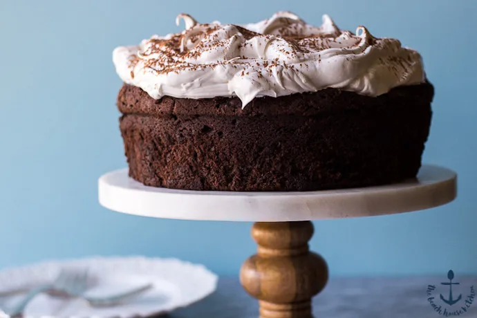 A complete guide to the best frosting recipes, including this marshmallow-like, lucious topping for the throwback Devil Dog Cake. | The Beach House Kitchen