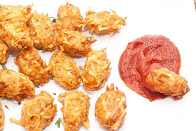 Tater tots recipes for kids can be simple, healthy and hearty. With a few simple potatoes you can make these creamy yet crisp Tater Tots from Scratch. | Served From Scratch