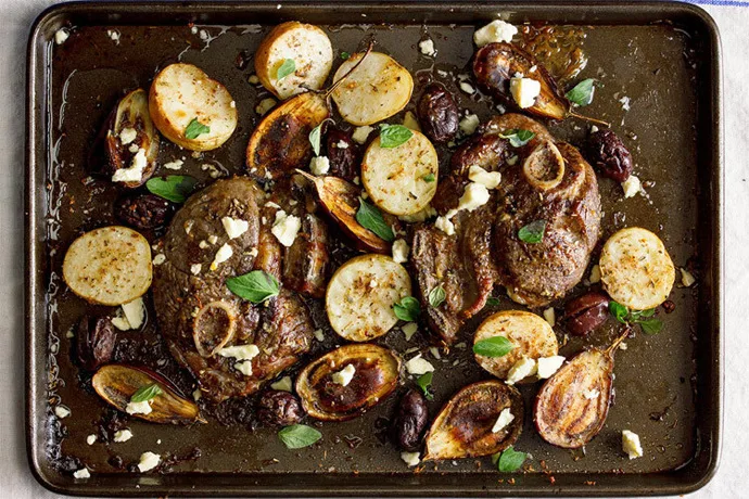 7 easy sheet pan dinners that make weeknight dinners so simple, including this Greek Lamb Tray Bake at A Fork & A Pencil | Cool Mom Eats