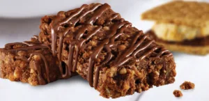 Among our favorite peanut- and nut-free granola bars, Enjoy Life S'mores Decadent Bars. And bonus: All of their products are free of the eight most common food allergens. | Cool Mom Eats