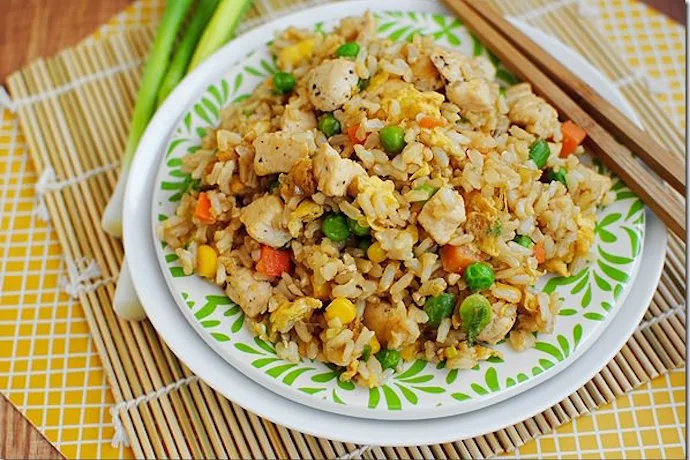 A simple, satisfying meal that comes together using store-bought rotisserie chicken: Easy Chicken Fried Rice. | Iowa Girl Eats
