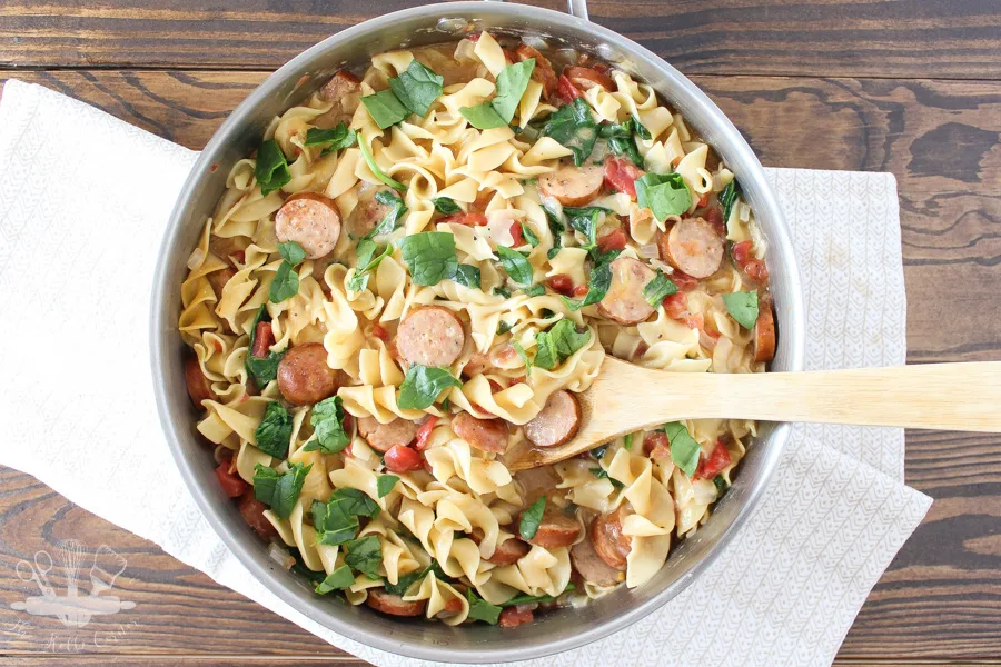 We adore -- make that, NEED -- super fast pasta recipes that come together in just minutes, like this One Pot Sausage and Spinach Pasta at The Kolb Corner