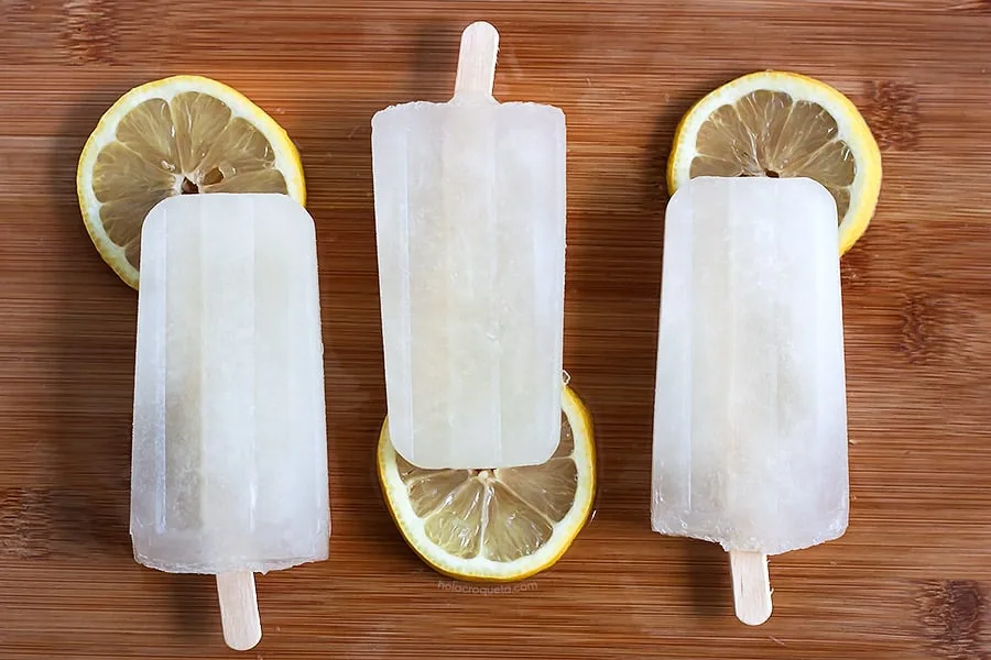 10 great gourmet popsicle recipes: Honey Whiskey Lemonade popsicles at A Sassy Spoon