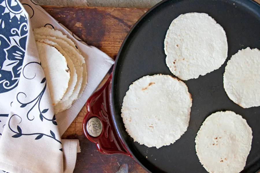 How to get the best corn tortillas: follow one of our four techniques for how to warm store-bought or (even better) make them using this easy recipe for homemade corn tortillas at Muy Bueno