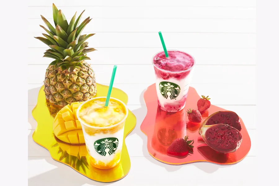 Meet the two new Frappucino blended Crème drinks at Starbucks: Berry Prickly Pear and Mango Pineapple. These new Starbucks drinks are summer in a cup. Delicious! | Cool Mom Eats
