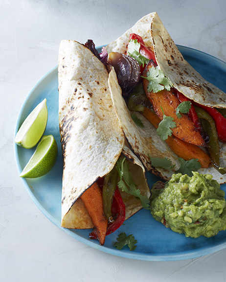 Cool Mom Eats weekly meal plan: Sheet Pan Veggie Fajitas from the Make It Easy cookbook by our editor Stacie Billis 