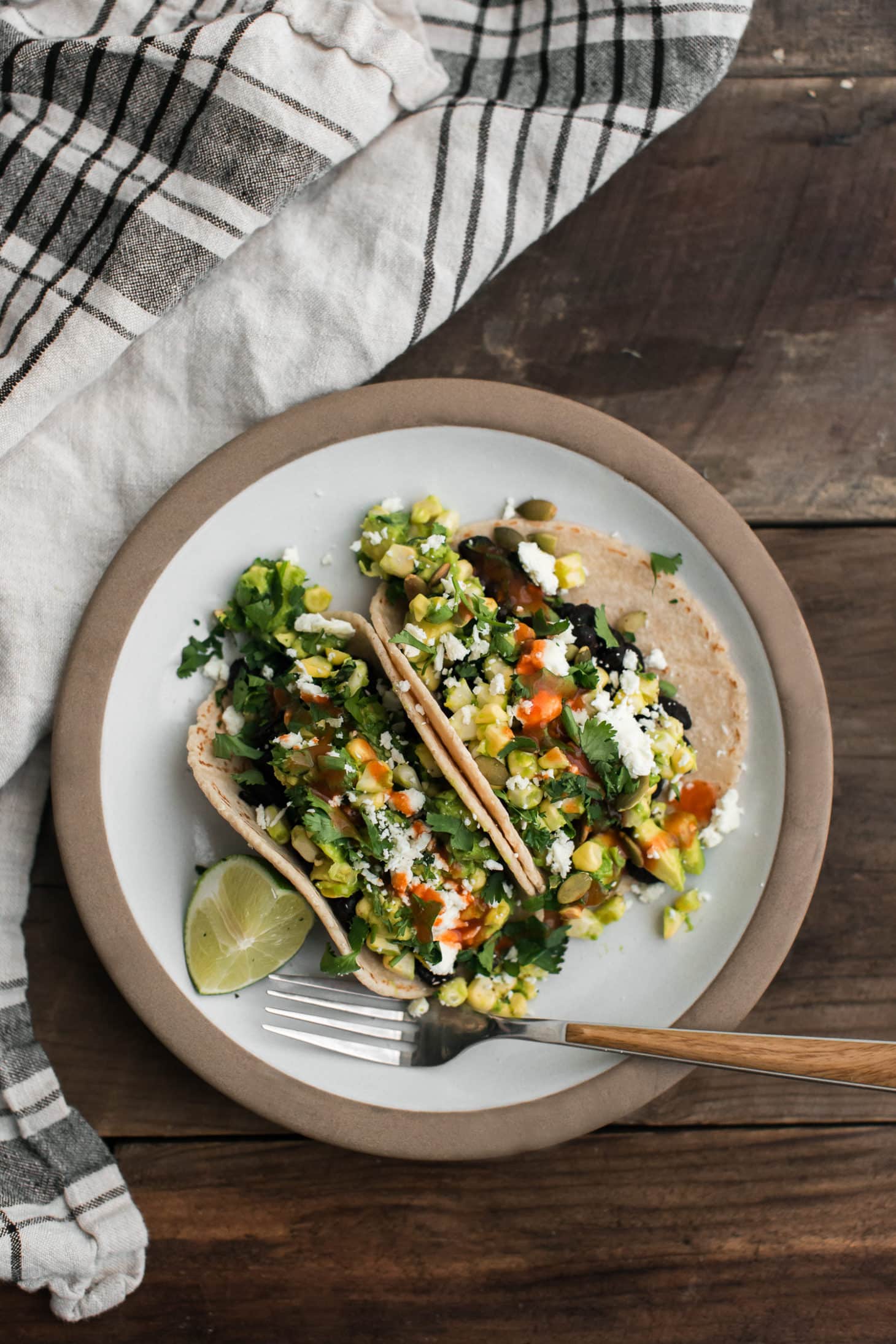 Cool Mom Eats weekly meal plan: Black Bean Tacos with Corn-Avocado Salad at Naturally Ella