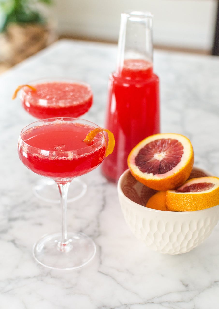 Make ahead holiday cocktail recipes | blood orange mimosa pitcher cocktail at The Kitchn.