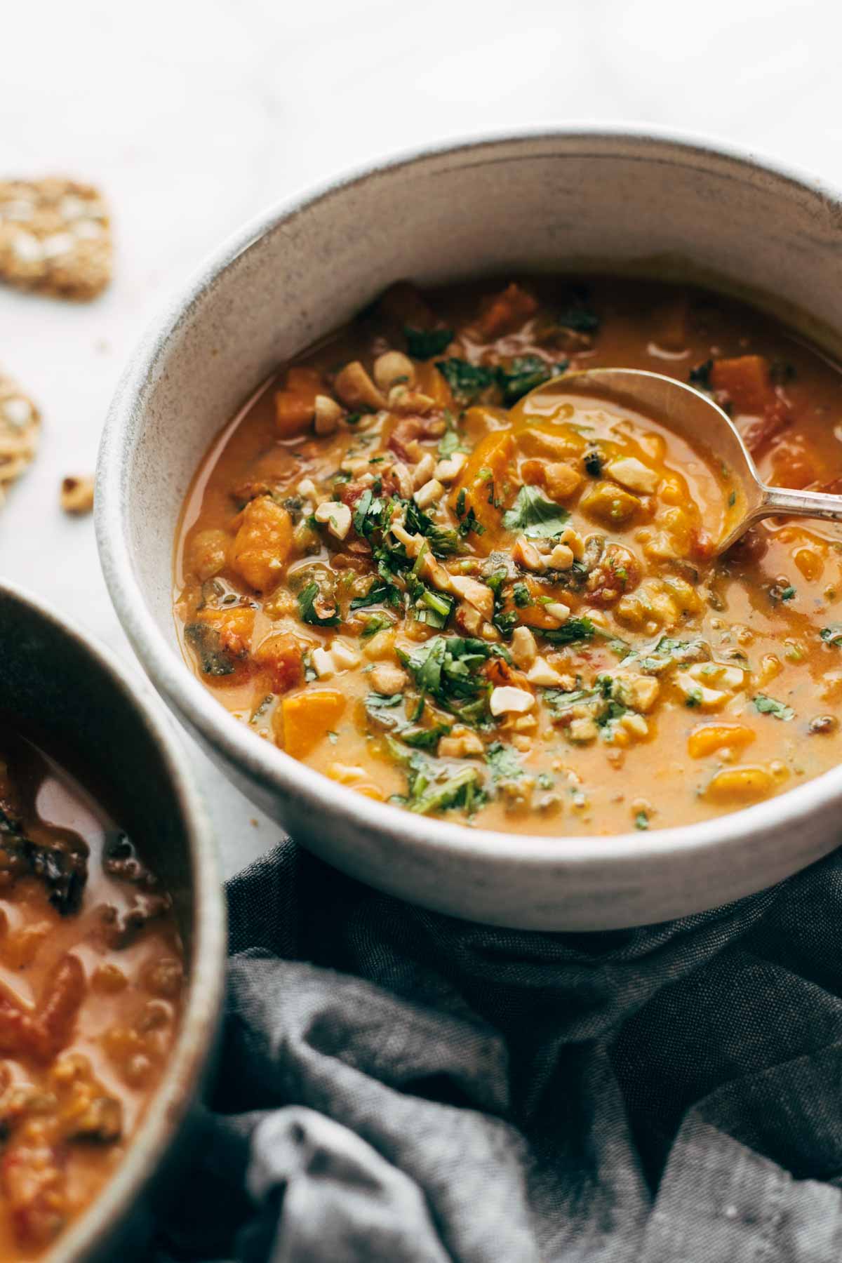 Skinny Instant Pot recipes: Spicy Peanut Soup with Sweet Potatoes and Kale | Pinch of Yum