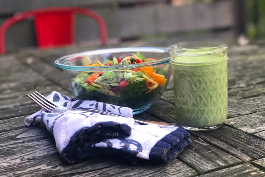 A creamy vegan (and Paleo-friendly) Green Goddess salad dressing recipe that will be your family’s new obsession. We swear.