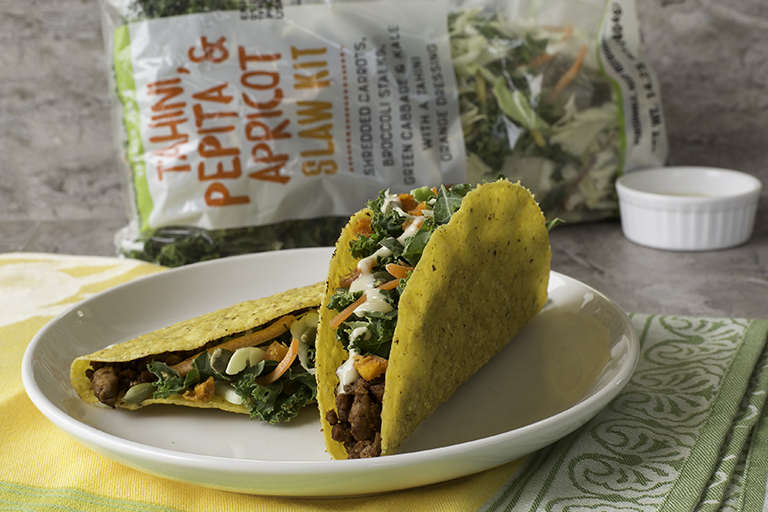 What family-friendly products to buy at Trader Joe's this month: Tahini, Pepita, Apricot Slaw Kit | Cool Mom Eats