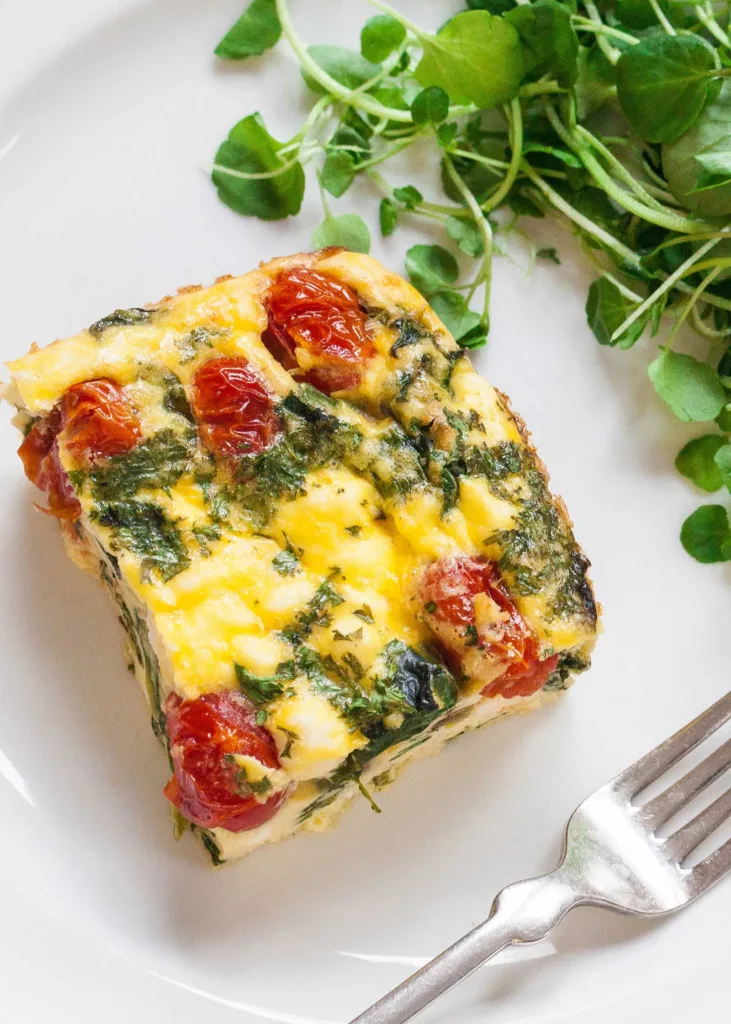 Make-ahead easter brunch ideas: Make-Ahead Egg Bake (or Fritatta) with Spinach, Tomato, and Feta from Sally Vargas for Simply Recipes Make-ahead easter brunch ideas: Make-Ahead Egg Bake (or Fritatta) with Spinach, Tomato, and Feta from Sally Vargas for Simply Recipes