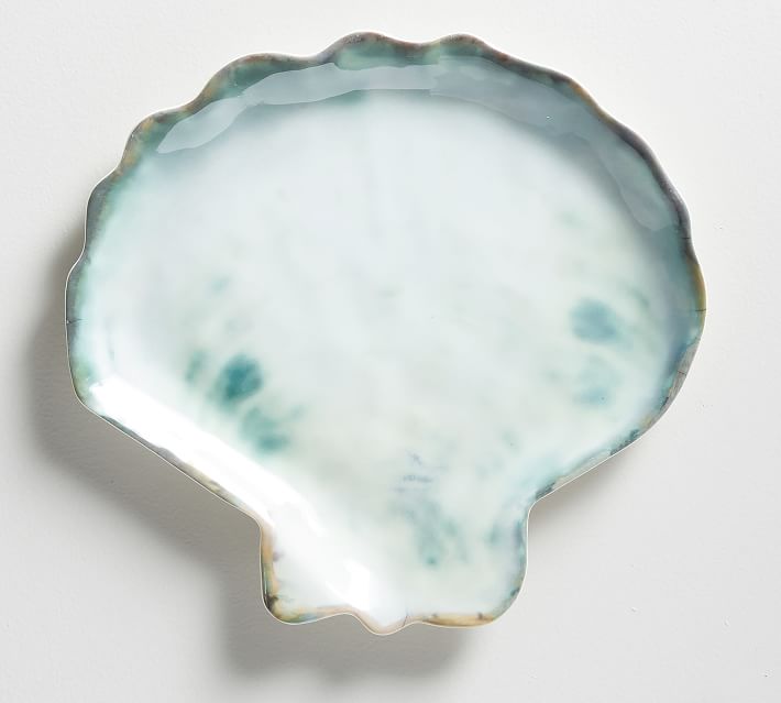 Must-have melamine dishes for outdoor entertaining: Shell-shaped melamine plates at Pottery Barn