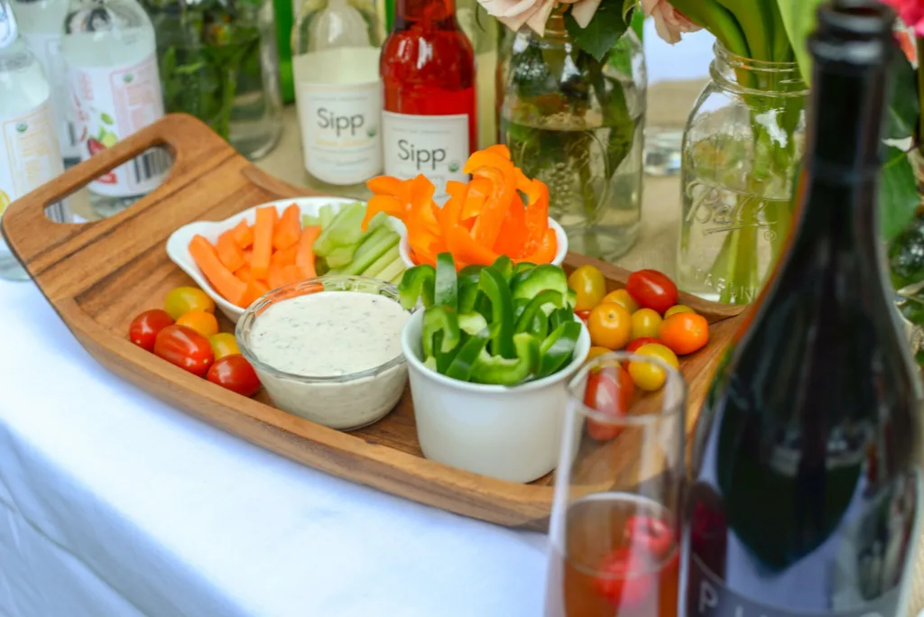 Easy shortcuts for backyard party planning: Ready made crudite transferred into pretty containers | Pumpernickel & Rye