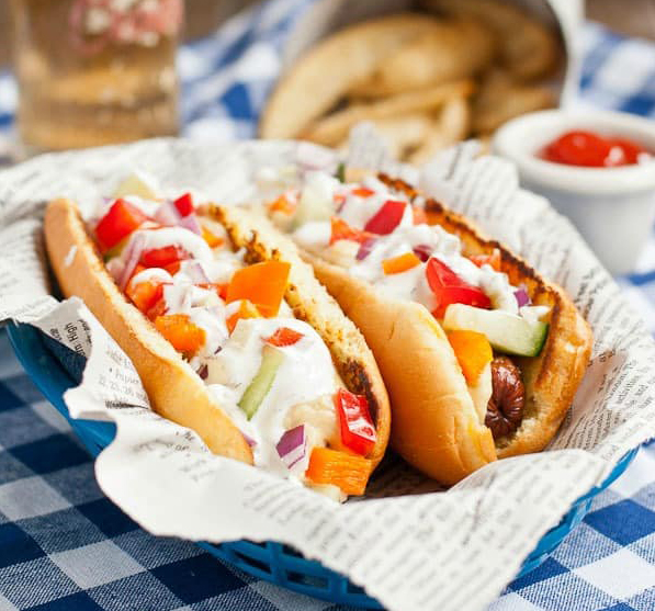 Creative hot dog toppings: Greek style dogs with hummus, veggies and tzatziki from Neighborhood Food Blog Creative hot dog toppings: Greek style dogs with hummus, veggies and tzatziki from Neighborhood Food Blog