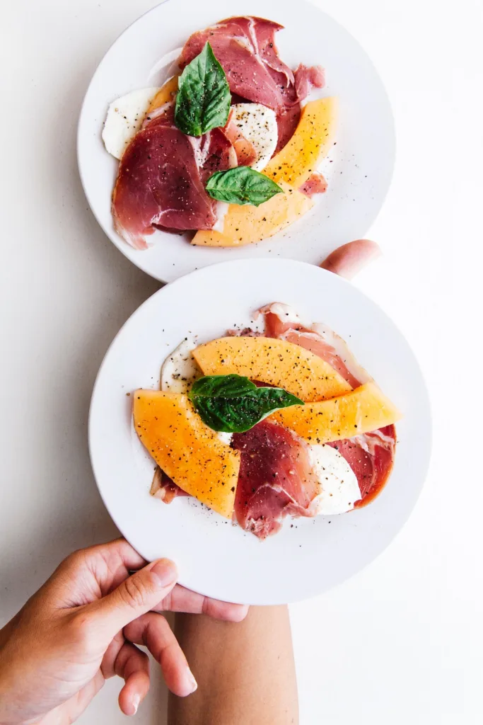 Weekly meal plan: Cooking with what's in season in July, like an easy proscuitto, melon, mozzarella and basil salad that can work as a meal | Cool Mom Eats 