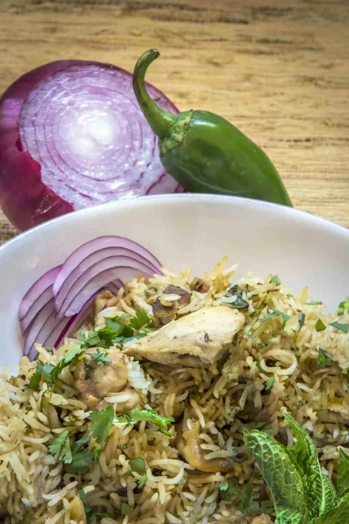 Instant Pot Chicken Biryani with Jasmine Rice cuts prep time down to 15 minutes, with 30 minutes of cook time! | Recipe: Urvashi Pitre at Two Sleevers Instant Pot Chicken Biryani with Jasmine Rice cuts prep time down to 15 minutes, with 30 minutes of cook time! | Recipe: Urvashi Pitre at Two Sleevers
