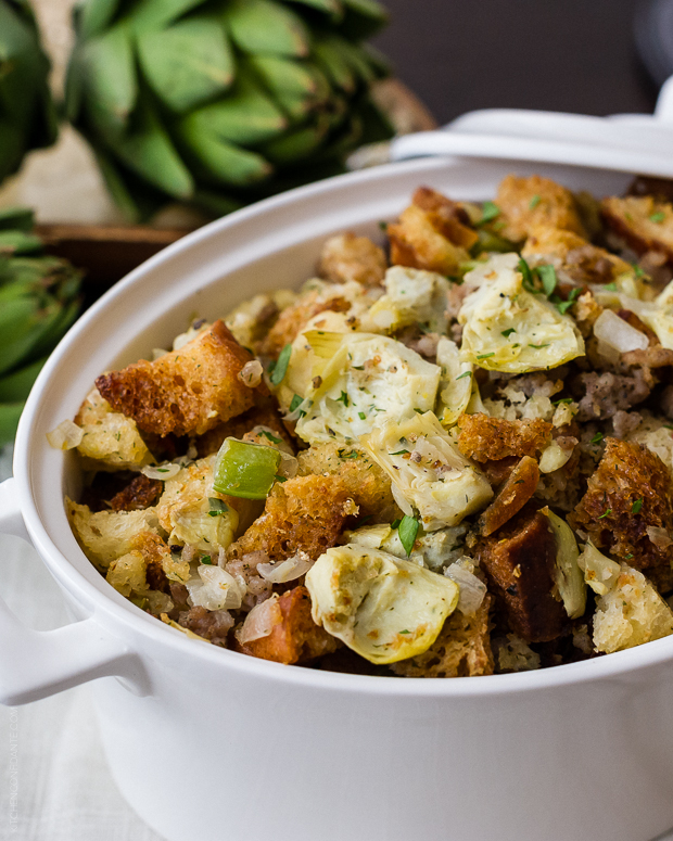 Best Thanksgiving stuffing recipes: Artichoke Sourdough Stuffing with Sausage at Kitchen Confidante