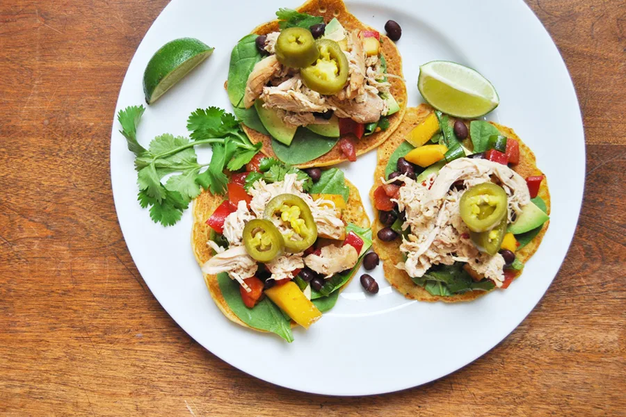 The easiest, most versatile slow cooker pulled chicken recipe that the whole family swears by