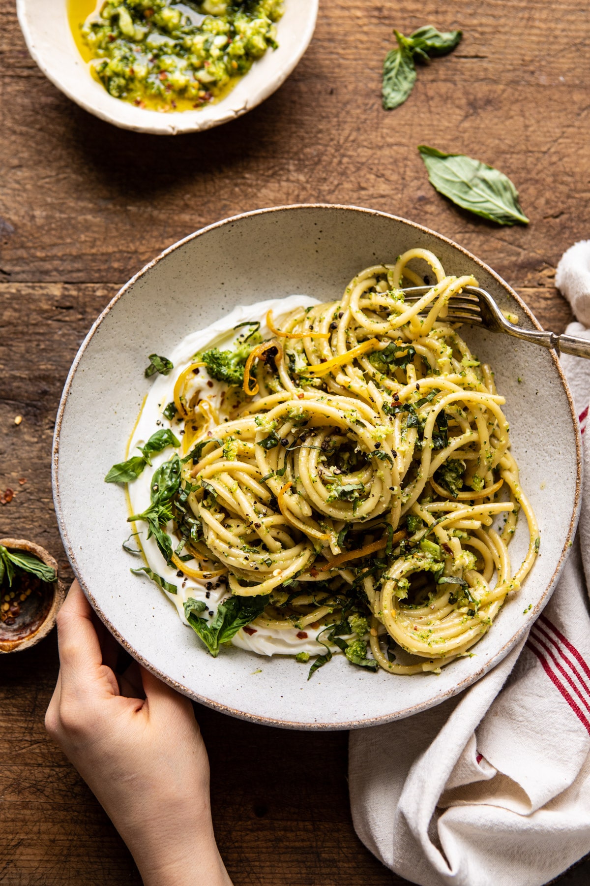 Lighter family dinner ideas for spring: Broccoli pesto pasta with whipped ricotta at Half Baked Harves