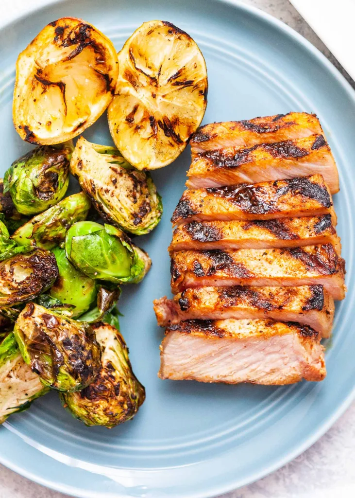 Spring meal ideas to lighten up family dinnertime: Citrus brined grilled pork chops via Simply Recipes