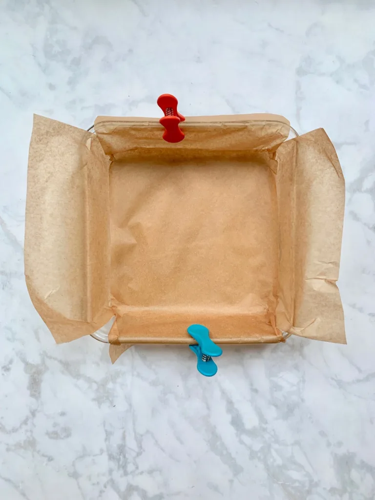 How to remove brownies from the pan: clip in place | © Jane Sweeney Cool Mom Eats