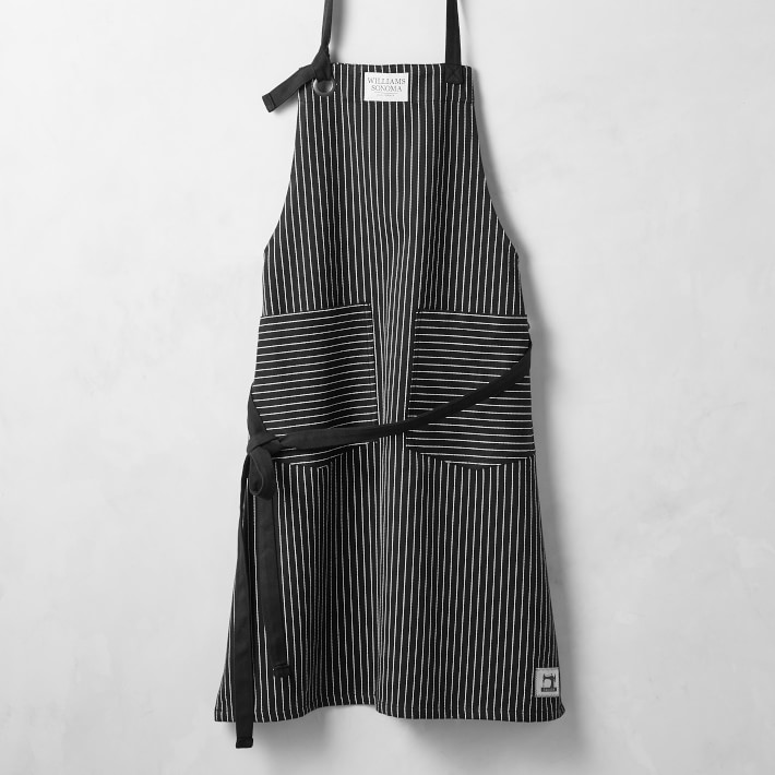 Modern aprons for spring we love:  Black pinstripes from Williams-Sonoma are our new little black dress, haha.