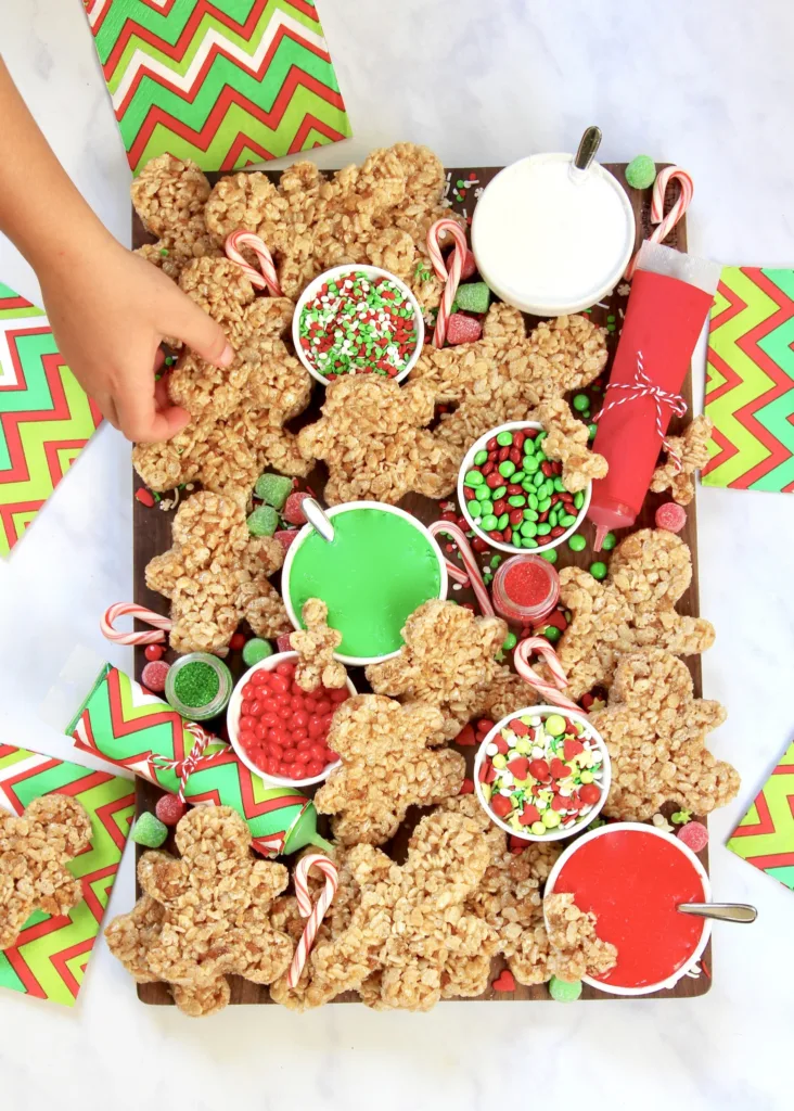 Have a no-bake gingerbread men decorating party with this snack tray idea from The Baker Mama