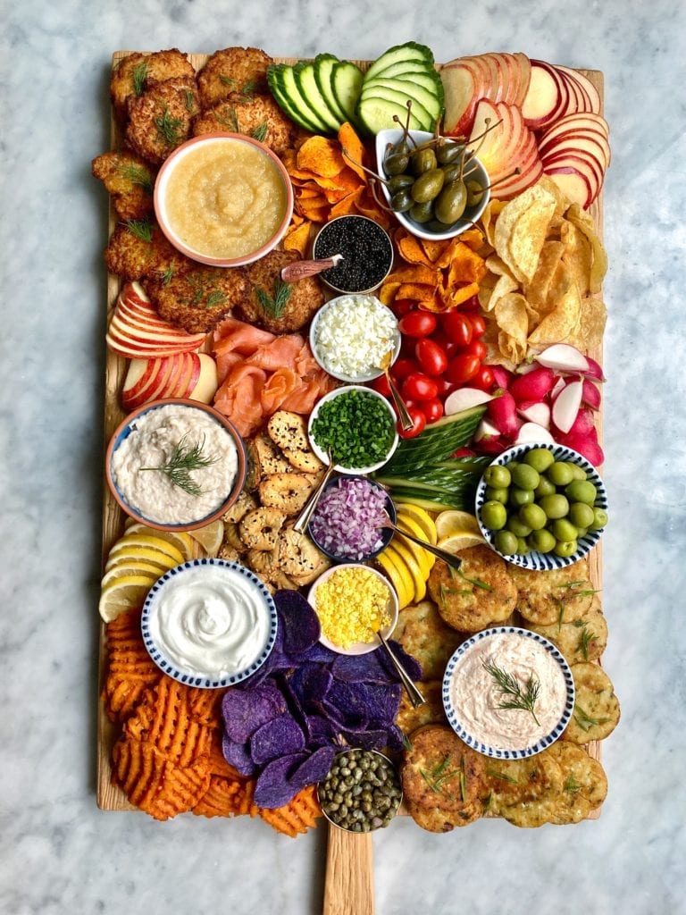 Create a latke charcuterie board, like this one from Ain't Too Proud to Meg, to help celebrate Hanukkah