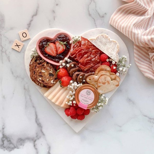 Our favorite boards for charcuterie boards: This marble heart board at Mark & Graham isn't just for Valentine's Day! Here are some ideas for using it.