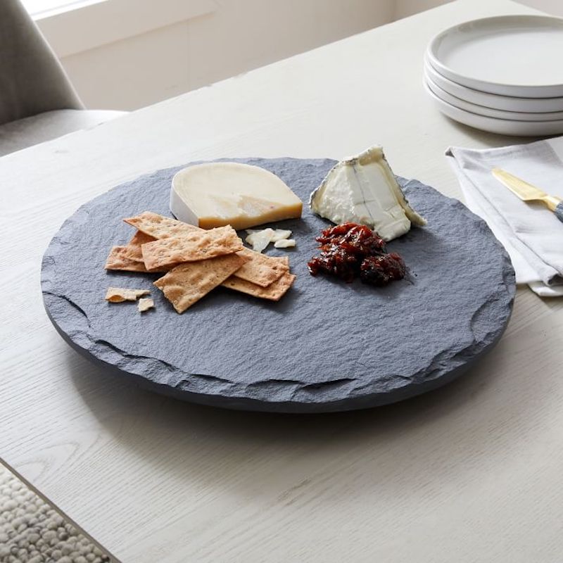 Our favorite boards for charcuterie boards: Round lazy susan boards at West Elm are right-sized for appetizers for dinner