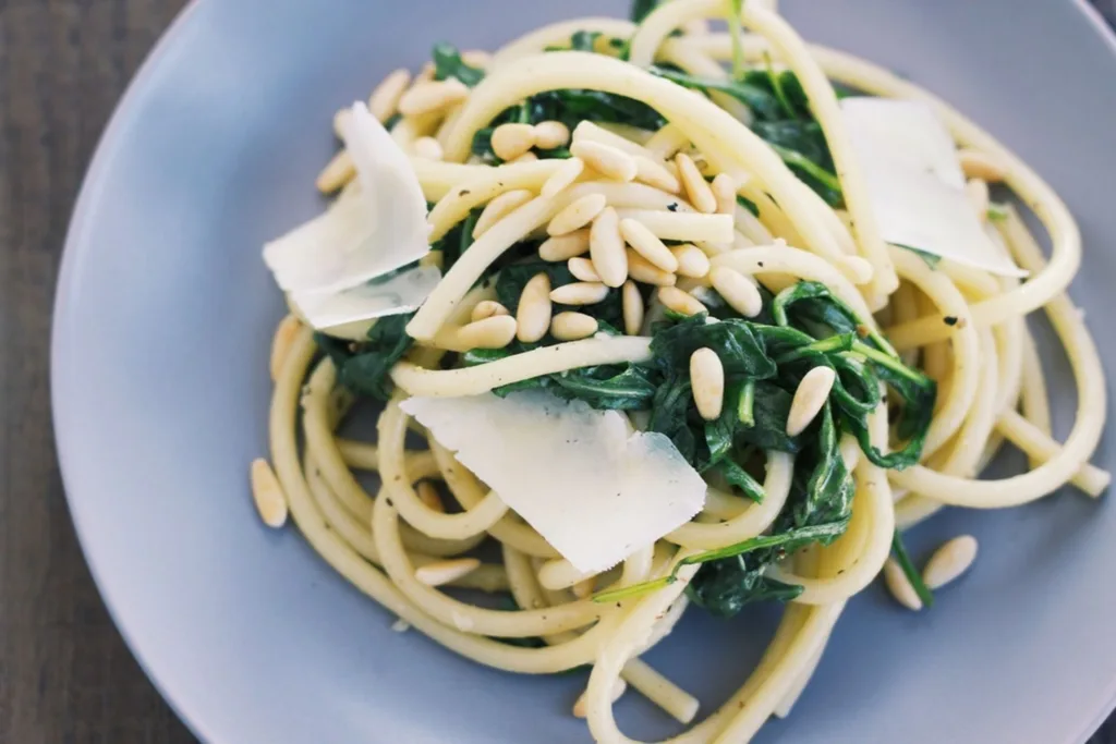 Lighter spring recipes; Lemon bucatini with wilted arugula at Food 52, by The Mess I Make