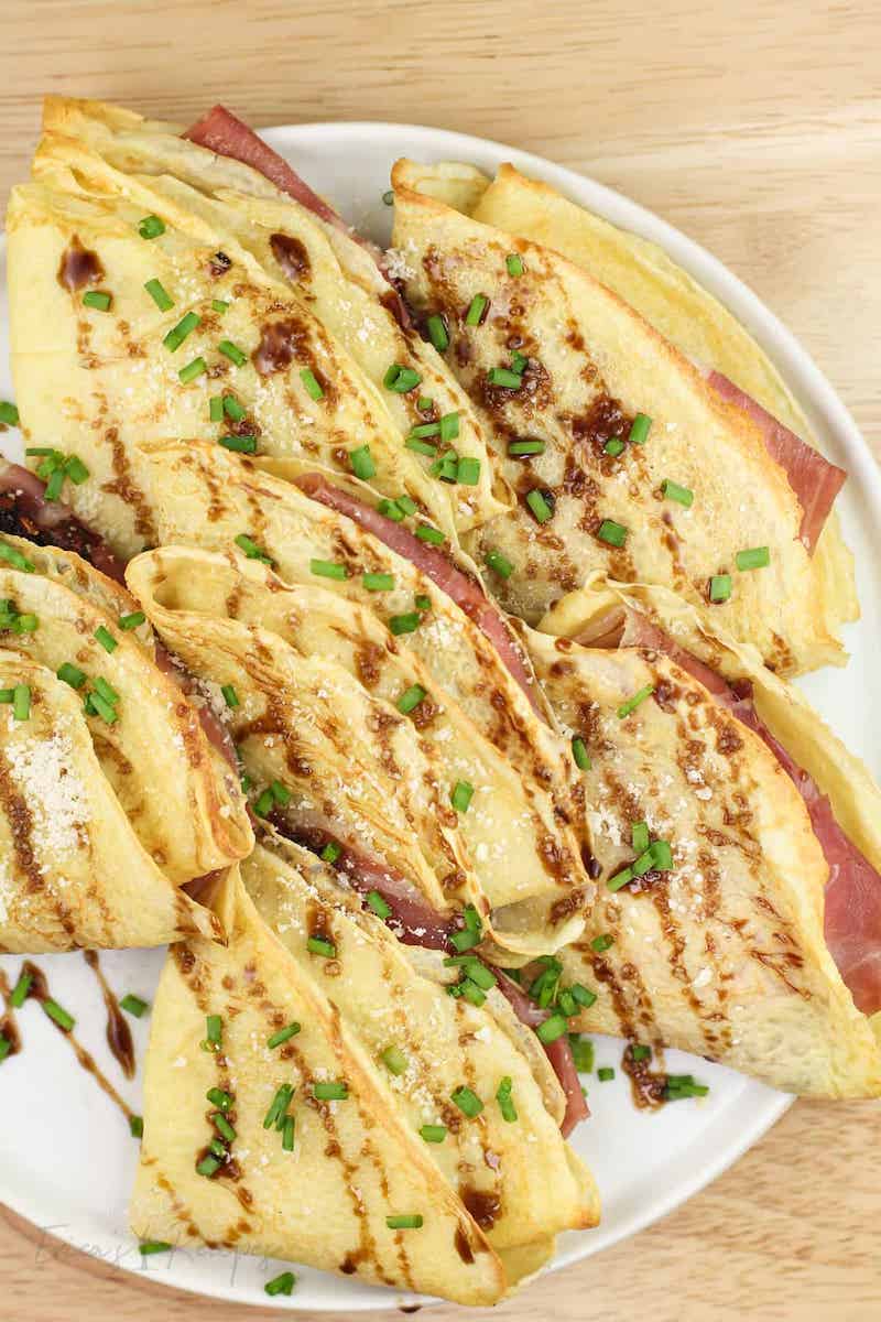 Easy spring appetizers for dinner at home: Crepes with prosciutto and cheese at Erica's Recipes are like fancy finger sandwiches but so easy to make Easy spring appetizers for dinner at home: Crepes with prosciutto and cheese at Erica's Recipes are like fancy finger sandwiches but so easy to make