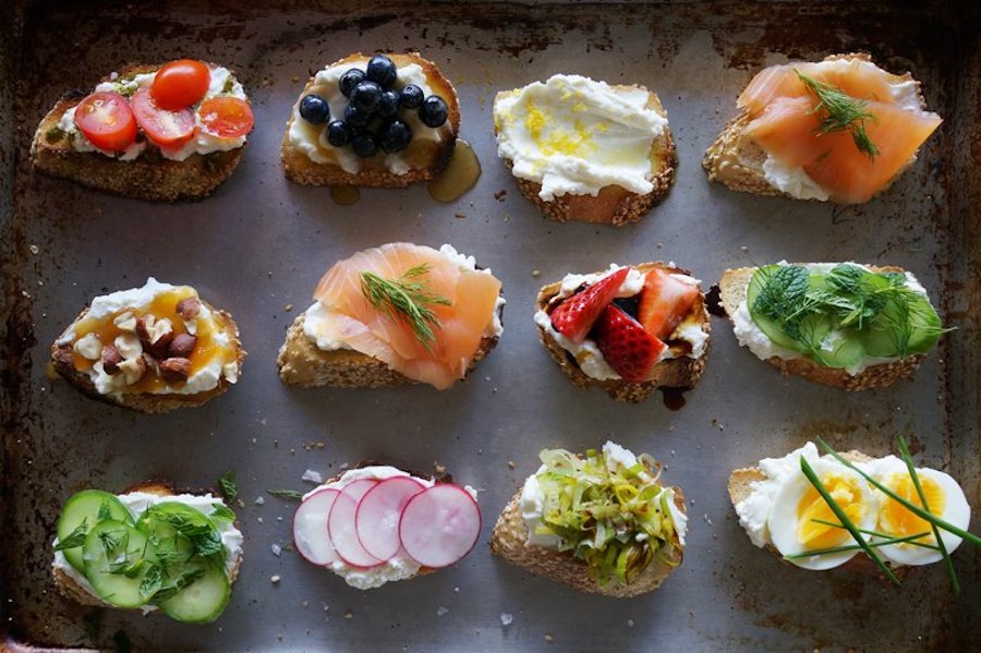 Easy food bar ideas for Mother's Day: A crostini bar with all the toppings | Honestly Yum
