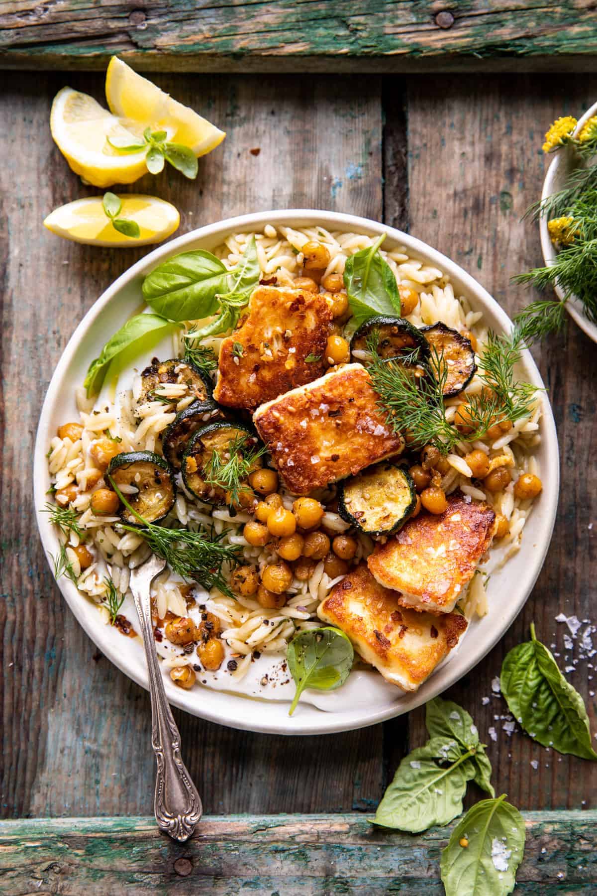 Weekly meal plan ideas: Crispy Lemon Feta with Spiced Chickpeas and Basil Orzo at Halfbaked Harvest