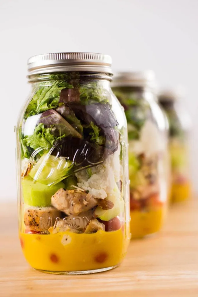 Follow these tips for mason jar salads from A Sweet Pea Chef and you'll have a week of school lunches ready to grab and go!