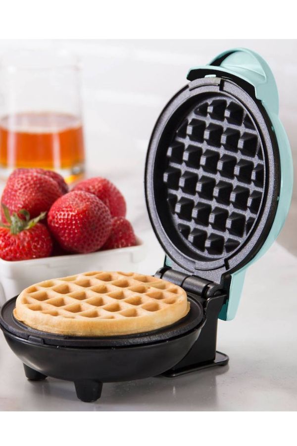 This Dash mini maker waffle iron is a cool food gadget found on TikTok. This Dash mini maker waffle iron is a cool food gadget found on TikTok.