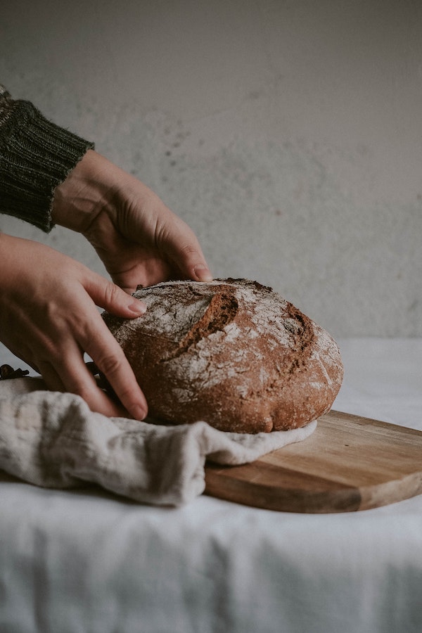 Bake bread to bring to a Thanksgiving potluck dinner