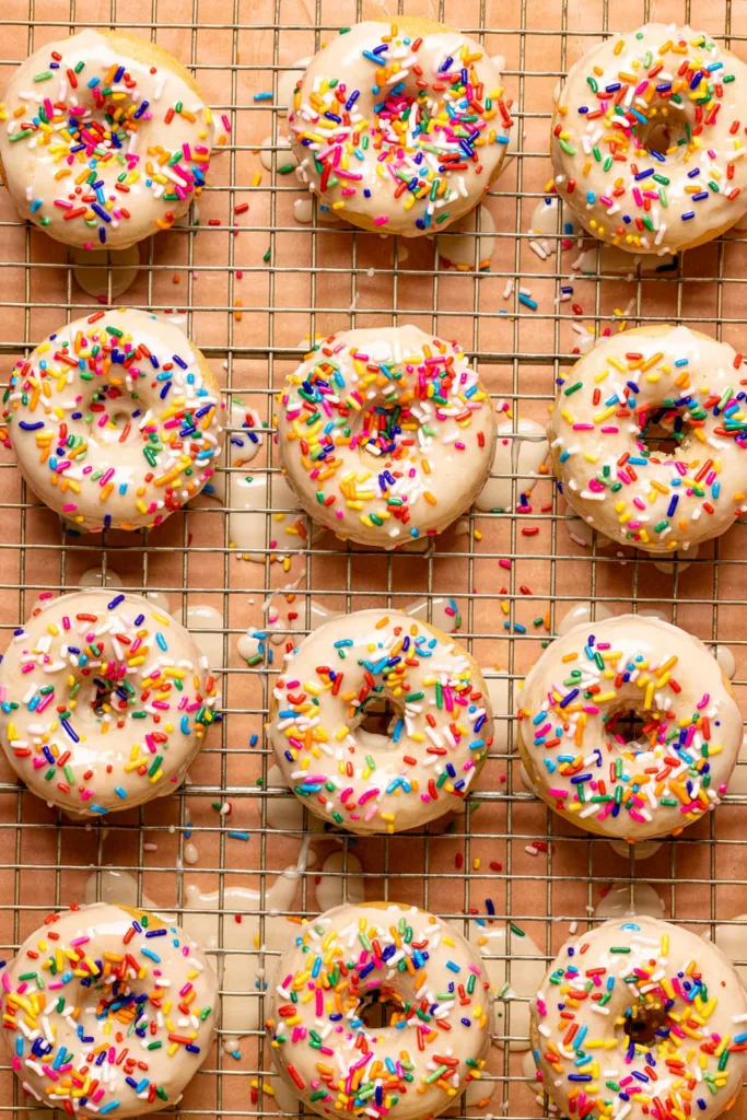 Vegan vanilla rainbow sprinkle donuts from Orchids and Sweet Tea Vegan vanilla rainbow sprinkle donuts from Orchids and Sweet Tea