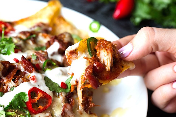 7 amazing nachos recipes for Super Bowl, March Madness, or whenever game day food is in order.