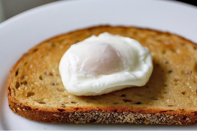 How to poach eggs with a trick from the kitchen goddess herself, Julia Child.