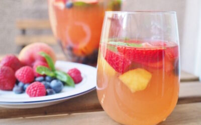 8 tasty twists on the traditional summer sangria recipe. Yum!