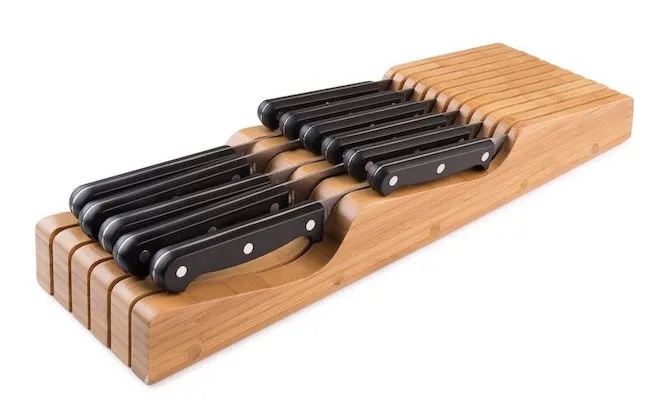 The Bellemain Bamboo Drawer Knife Organizer can help you store knives in your drawer safely and conveniently. 