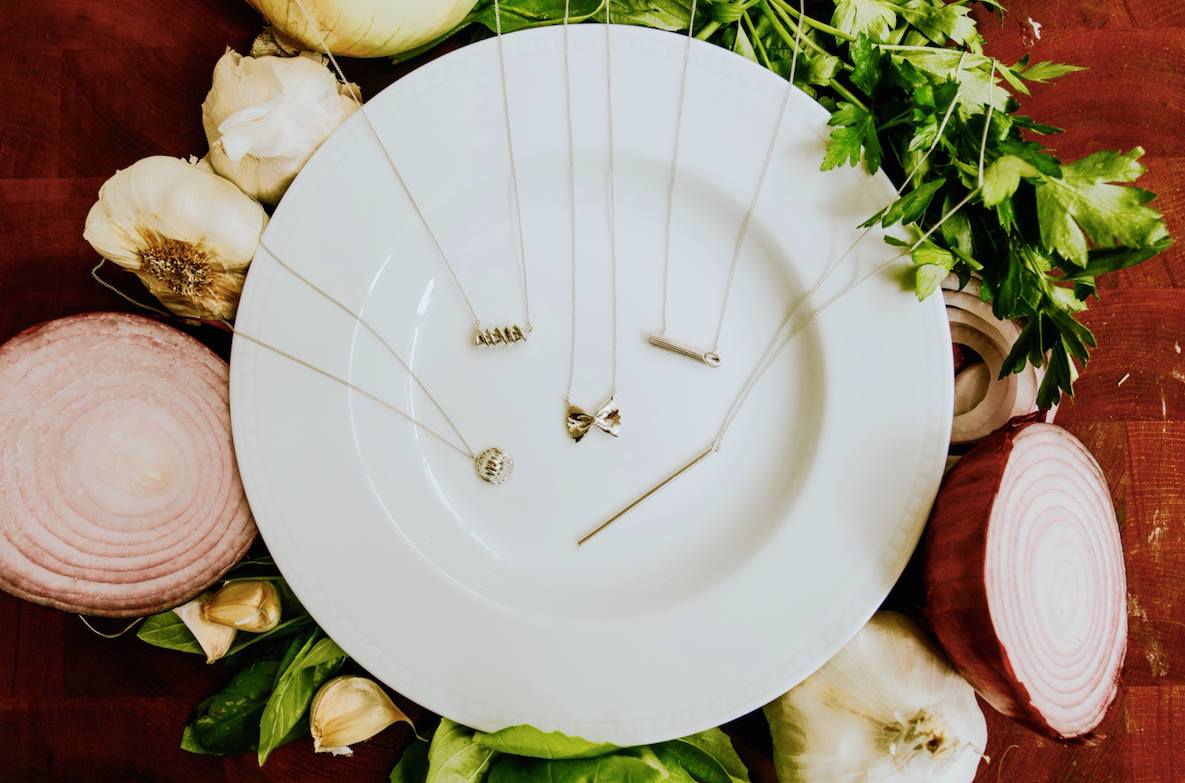Delicacies jewelry: Gorgeous food inspired bracelets and pendants, has launched a new "al dente" line of pasta necklaces in sterling silver, gold and gold with diamonds. Because Farfalle necklaces for the win! | Cool Mom Eats